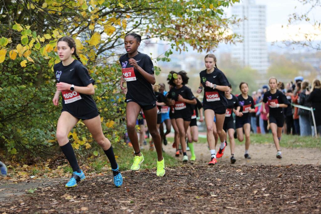 Females of mixed ethnicities run in LYG cross country