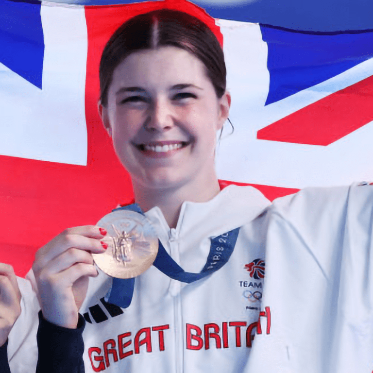 Andrea with british flag and medal